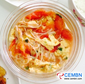Tomato and egg soup with Enoki mushrooms